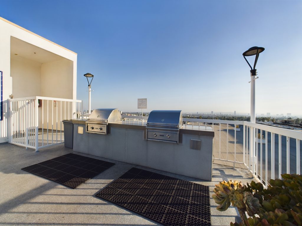 Rent a Hollywood CA apartment with a balcony featuring a grill and BBQ.