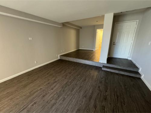 Apartments in Hollywood, CA, Studio Apartment - Plan E Living Area with view to Bathroom  Entryway